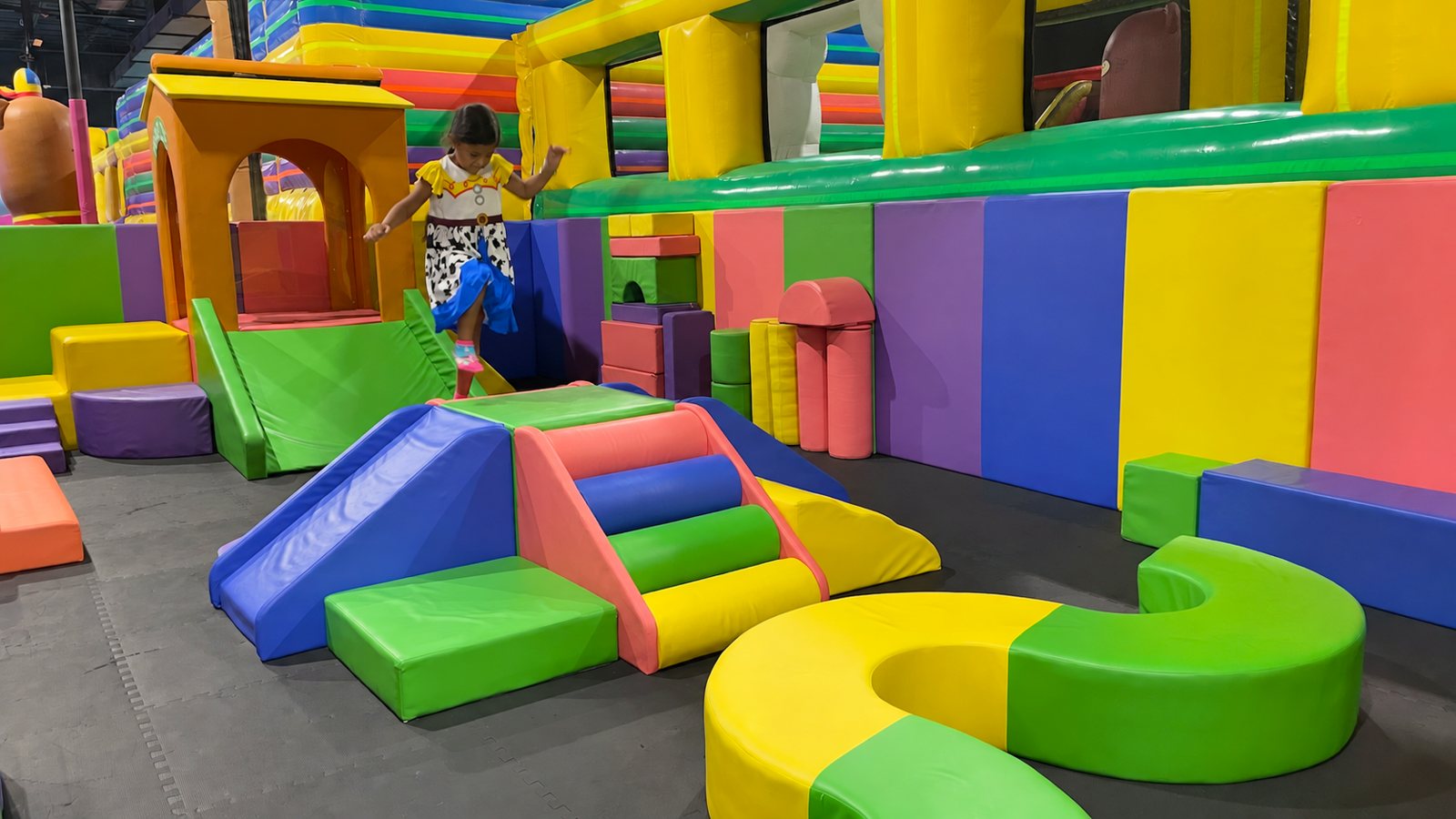 Toddler soft-play area at FUNBOX Houston with foam blocks and a mini slide