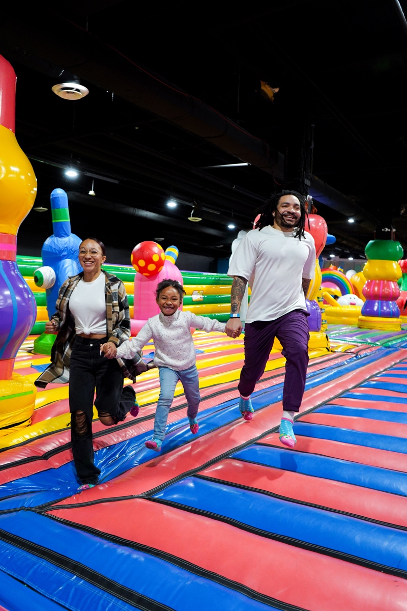 Family bouncing together at FUNBOX