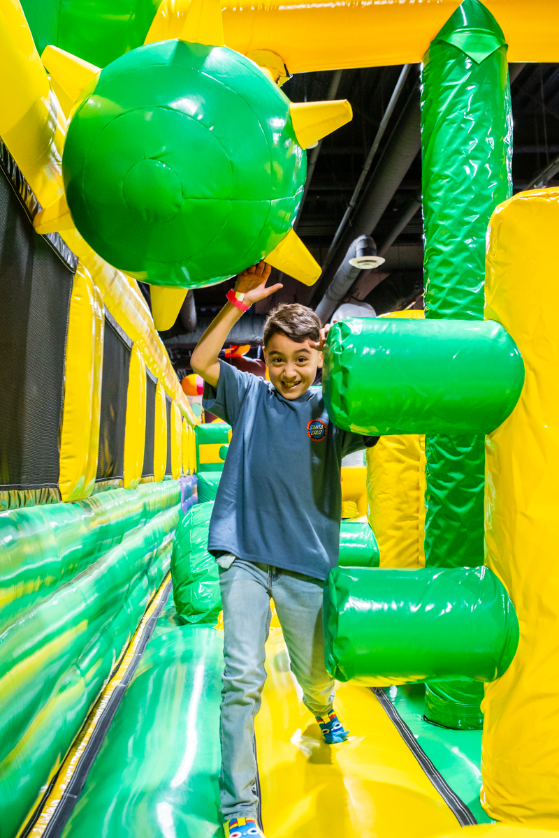 Boy running the FUNBOX obstacle course